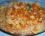 Foto del paso 7 de la receta: Tallarines con pollo en salsa natural de tomate al ajo y perejil