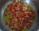 Foto del paso 3 de la receta: Calamares con arroz y pimientos rojos