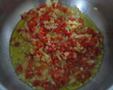 Foto del paso 3 de la receta: Calamares con arroz y pimientos rojos