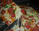 Foto del paso 14 de la receta Pizza con salchichas de viena 
