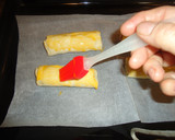 Foto del paso 4 de la receta: Cañas de hojaldre de jamón york y queso mozzarella
