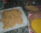 Foto del paso 4 de la receta: Calamares rebozados en pan rallado