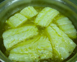 Foto del paso 3 de la receta: Bacalao con ajetes al pil pil