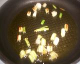 Foto del paso 2 de la receta: Espinacas fritas con ajos tiernos