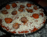 Foto del paso 6 de la receta: Pizza de arroz con chorizos y huevos