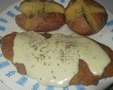 Foto del paso 4 de la receta: Milanesas con queso cremoso y papas rústicas