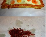 Foto del paso 7 de la receta: Banda de hojaldre con huevos y virutas de jamón