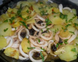 Foto del paso 7 de la receta: Calamares con patatas y pasas de uva al ron