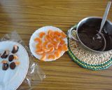 Foto del paso 3 de la receta: Gajos de mandarina con chocolate condimentado