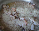 Foto del paso 7 de la receta: Arroz de calamar con almejas