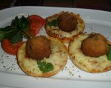 Foto del paso 9 de la receta: Albóndigas con napolitana gratinada en cazuelitas con brisa