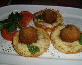 Foto del paso 9 de la receta: Albóndigas con napolitana gratinada en cazuelitas con brisa