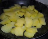 Foto del paso 3 de la receta: Alitas de pollo a la cola con patatas caramelizadas