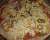 Foto del paso 3 de la receta: Pizza a la napolitana con masa de tarta