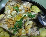 Foto del paso 5 de la receta: Sargo al horno con patatas y pimientos del padrón