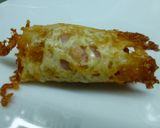 Foto del paso 3 de la receta: Canapés rollo de queso con jamón york