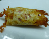 Foto del paso 3 de la receta: Canapés rollo de queso con jamón york