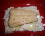 Foto del paso 2 de la receta: Bacalao confitado y pimiento envuelto