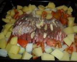 Foto del paso 3 de la receta: Cerdo asado a las hierbas con jamón y queso