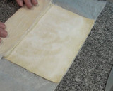 Foto del paso 1 de la receta: Palmeritas de hojaldre bañadas con chocolate