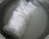 Foto del paso 7 de la receta: Albóndiga con salchichas y huevos duros