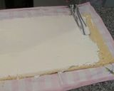 Foto del paso 12 de la receta: Brazo de gitano relleno de nata y recubierto de chocolate