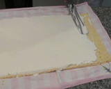 Foto del paso 12 de la receta: Brazo de gitano relleno de nata y recubierto de chocolate