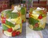 Foto del paso 5 de la receta: Queso feta y tomatitos en aceite de albahaca