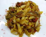 Foto del paso 4 de la receta: Bacalao desmigado con pimientos y patatas