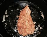 Foto del paso 6 de la receta: Pechuga de pollo cubierta con parmesano y panko