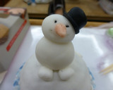 Foto del paso 6 de la receta: Cupcake navideño de muñeco de nieve