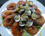 Foto del paso 3 de la receta: Gambones a la plancha con berberechos y mejillones naturales