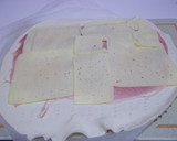 Foto del paso 3 de la receta: Piruletas de hojaldre con york y queso
