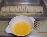 Foto del paso 7 de la receta: Piruletas de hojaldre con york y queso