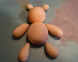 Foto del paso 8 de la receta: Cupcake de osos amorosos con biberones en fondant