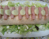 Foto del paso 8 de la receta: Arrollado de pionono con jamón, crema de pollo, palmitos y salsa golf