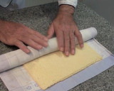 Foto del paso 9 de la receta: Brazo de gitano relleno de trufa y chocolate