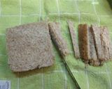 Foto del paso 4 de la receta: Sándwich integral con crema de pollo