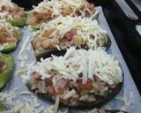 Foto del paso 7 de la receta: Berenjenas y calabacines rellenos de arroz y bacón