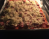 Foto del paso 4 de la receta: Pizza de hojaldre con salchichas y chorizo