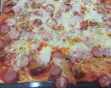 Foto del paso 5 de la receta: Pizza de hojaldre con salchichas y chorizo