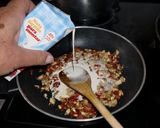 Foto del paso 3 de la receta: Champiñones rellenos de jamón y nata