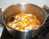 Foto del paso 10 de la receta: Arroz caldoso de calamares y alcachofas