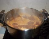 Foto del paso 14 de la receta: Arroz caldoso de calamares y alcachofas