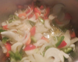 Foto del paso 3 de la receta: Manitas de cerdo en fritada
