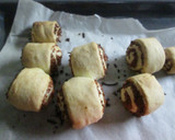 Foto del paso 3 de la receta: Rollitos de hojaldre con queso rallado