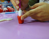 Foto del paso 6 de la receta: Muñeca de fondant, las piernas y botas