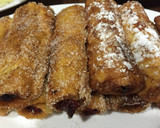 Foto del paso 5 de la receta: Rollitos de pan de molde rellenos de queso crema o nutella con fresas