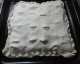 Foto del paso 4 de la receta: Tarta de hojaldre con jamón, queso y beicon