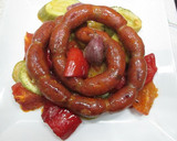 Foto del paso 4 de la receta: Mini chorizos colorados con variado de verduras al horno